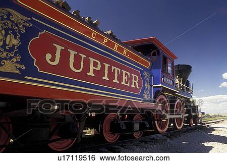 Stock Photograph -  locomotive, train, Golden Spike National Historic Site, UT, Utah, The 1869 Steam Locomotive Jupiter at the Golden Spike Nat'l Historic Site where the Union Pacific and Central Pacific rails met on May 10, 1869. Fotosearch