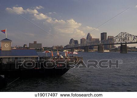 Stock Photo -  Louisville, KY, Kentucky, Ohio River, Skyline of downtown Louisville along the Ohio River from Towboat Annie's Restaurant.. Fotosearch