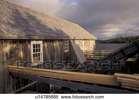 Stock Photography -  lumber mill, Sherbrooke, Nova Scotia, NS, Canada, Sawmill in the town of Sherbrooke in Nova Scotia. . Fotosearch