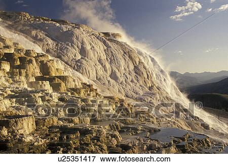Stock Photo -  Mammoth Hot Springs, Yellowstone National Park, WY, Wyoming, Canary Springs, a terrace-like formation created by limestone deposits, at Mammoth Hot Springs in Yellowstone Nat'l Park in Wyoming. . Fotosearch