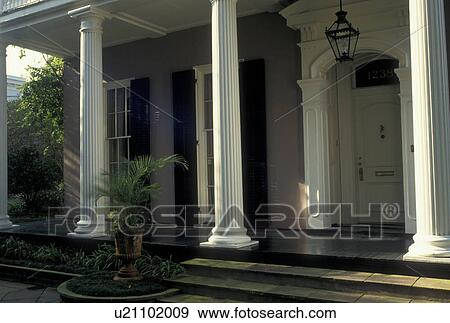 Stock Photo -  mansion, New Orleans, LA, Louisiana, Garden District, A single town house with columns built in 1853 at 1238 Philip Street in the Garden District in New Orleans. . Fotosearch
