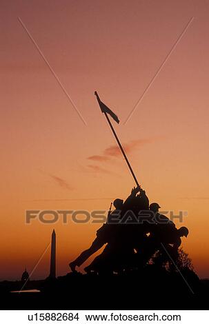 Marine Corps Memorial, Iwo Jima, sunrise, Arlington, VA, Arlington National Cemetery, Virginia, Silhouette of the U. S. Marine Corps Memorial, Iwo Jima, at the Arlington Nat'l Cemetery with the Washington Monument and US Capitol Building in the distance a View Large Photo Image Picture - Marine Corps Memorial, Iwo Jima, sunrise, Arlington, VA, Arlington National Cemetery, Virginia, Silhouette of the U. S. Marine Corps Memorial, Iwo Jima, at the Arlington Nat'l Cemetery with the Washington Monument and US Capitol Building in the distance a. Fotosearch