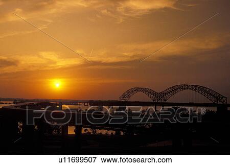 Memphis, Mississippi River, TN, Tennessee, Bridges at sunset over the Mississippi River in Memphis. View Large Photo Image Stock Photo - Memphis, Mississippi River, TN, Tennessee, Bridges at sunset over the Mississippi River in Memphis.. Fotosearch