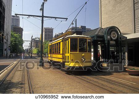 Memphis, trolley, TN, Tennessee, The Main Street Trolley picking up passengers at the trolley station on Main Street in downtown Memphis. View Large Photo Image Stock Image - Memphis, trolley, TN, Tennessee, The Main Street Trolley picking up passengers at the trolley station on Main Street in downtown Memphis.. Fotosearch