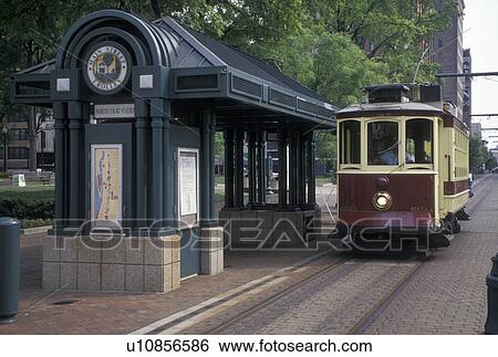 Memphis, trolley, TN, Tennessee, The Main Street Trolley approaching trolley station on Main Street in downtown Memphis. View Large Photo Image Stock Photograph - Memphis, trolley, TN, Tennessee, The Main Street Trolley approaching trolley station on Main Street in downtown Memphis.. Fotosearch