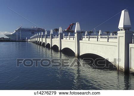 Miami, FL, Florida, Atlantic Ocean, Cruise ship docked at the end of the bridge to Hibiscus Island crosses Biscayne Bay in Miami. View Large Photo Image Stock Photo - Miami, FL, Florida, Atlantic Ocean, Cruise ship docked at the end of the bridge to Hibiscus Island crosses Biscayne Bay in Miami.. Fotosearch