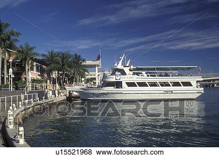 Miami, FL, Florida, Atlantic Ocean, Sightseeing cruise boat docked at Bayside Marketplace, a shopping, dining, entertainment mecca, on Biscayne Bay in downtown Miami. View Large Photo Image Stock Photo - Miami, FL, Florida, Atlantic Ocean, Sightseeing cruise boat docked at Bayside Marketplace, a shopping, dining, entertainment mecca, on Biscayne Bay in downtown Miami.. Fotosearch