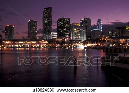 Miami, FL, skyline, Florida, Atlantic Ocean, Skyline of downtown Miami from Bayside on Biscayne Bay in the evening. View Large Photo Image Stock Image - Miami, FL, skyline, Florida, Atlantic Ocean, Skyline of downtown Miami from Bayside on Biscayne Bay in the evening.. Fotosearch