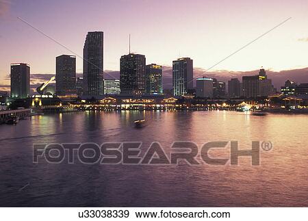 Miami, FL, skyline, Florida, Atlantic Ocean, Skyline of downtown Miami from Bayside on Biscayne Bay in the evening. View Large Photo Image Stock Photo - Miami, FL, skyline, Florida, Atlantic Ocean, Skyline of downtown Miami from Bayside on Biscayne Bay in the evening.. Fotosearch