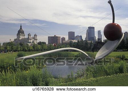 Minneapolis, MN, cherry, spoon, Minnesota, Twin Cities, Spoon Bridge and Cherry Sculpture In the Minneapolis Sculpture Garden at Walker Art Center in Minneapolis. View of the downtown skyline of Minneapolis in the background. View Large Photo Image Stock Photo - Minneapolis, MN, cherry, spoon, Minnesota, Twin Cities, Spoon Bridge and Cherry Sculpture In the Minneapolis Sculpture Garden at Walker Art Center in Minneapolis. View of the downtown skyline of Minneapolis in the background.. Fotosearch