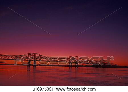 Mississippi River, bridge, Natchez, MS, Mississippi, Scenic view of a bridge spanning the Mississippi River at sunset in Natchez. View Large Photo Image Stock Image - Mississippi River, bridge, Natchez, MS, Mississippi, Scenic view of a bridge spanning the Mississippi River at sunset in Natchez. . Fotosearch