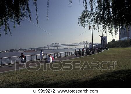 Stock Image -  Mississippi River, Riverfront Park, New Orleans, LA, waterfront, Louisiana, Moonwalk at Waldenberg Riverfront Park along the Mississippi River in New Orleans. . Fotosearch