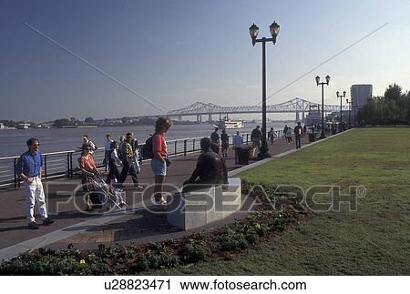 Mississippi River, waterfront, New Orleans, LA, Riverfront Park, Louisiana, People on the Moonwalk at Waldenberg Riverfront Park along the Mississippi River in New Orleans. View Large Photo Image Stock Image - Mississippi River, waterfront, New Orleans, LA, Riverfront Park, Louisiana, People on the Moonwalk at Waldenberg Riverfront Park along the Mississippi River in New Orleans.. Fotosearch
