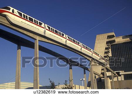 monorail, Disney World, FL, Orlando, Lake Buena Vista, Florida, Monorail travels on an elevated single rail outside of Disney's Contemporary Resort in Walt Disney World in Lake Buena Vista. View Large Photo Image Stock Photo - monorail, Disney World, FL, Orlando, Lake Buena Vista, Florida, Monorail travels on an elevated single rail outside of Disney's Contemporary Resort in Walt Disney World in Lake Buena Vista.. Fotosearch