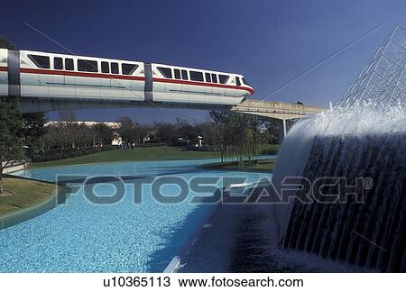monorail, FL, Disney World, Florida, Orlando, Epcot, Lake Buena Vista, The Monorail passes by a fountain in Epcot Center at Walt Disney World in Lake Buena Vista. View Large Photo Image Stock Image - monorail, FL, Disney World, Florida, Orlando, Epcot, Lake Buena Vista, The Monorail passes by a fountain in Epcot Center at Walt Disney World in Lake Buena Vista. . Fotosearch