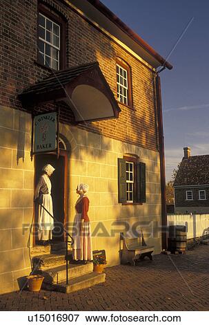 Moravian, Old Salem, Winston-Salem, NC, North Carolina, Women in authentic Moravian costumes outside Winkler Bakery in Old Salem, a living history restoration of the Moravian Church town of Salem founded in 1766, in the fall in Winston-Salem. View Large Photo Image Stock Photo - Moravian, Old Salem, Winston-Salem, NC, North Carolina, Women in authentic Moravian costumes outside Winkler Bakery in Old Salem, a living history restoration of the Moravian Church town of Salem founded in 1766, in the fall in Winston-Salem.. Fotosearch