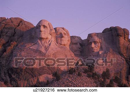 Stock Photograph -  Mount Rushmore National Memorial, SD, South Dakota, Mt. Rushmore, Black Hills, Mount Rushmore Nat'l Memorial at sunrise.. Fotosearch