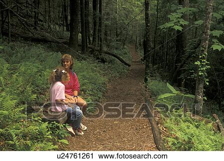 Nantahala National Forest, NC, North Carolina, Mother and nine year old daughter taking a rest from hiking in Joyce Kilmer Memorial Forest. View Large Photo Image Stock Image - Nantahala National Forest, NC, North Carolina, Mother and nine year old daughter taking a rest from hiking in Joyce Kilmer Memorial Forest.. Fotosearch
