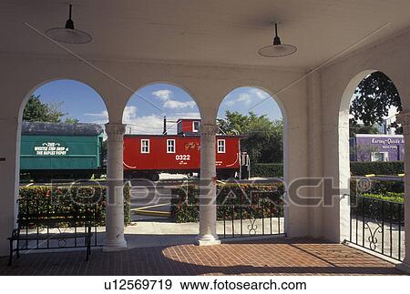 Naples, FL, Gulf of Mexico, Florida, A colorful train parked outside the Naples Depot Civic & Cultural Center is housed in a renovated 1927 train station in Naples. View Large Photo Image Stock Photo - Naples, FL, Gulf of Mexico, Florida, A colorful train parked outside the Naples Depot Civic & Cultural Center is housed in a renovated 1927 train station in Naples.. Fotosearch