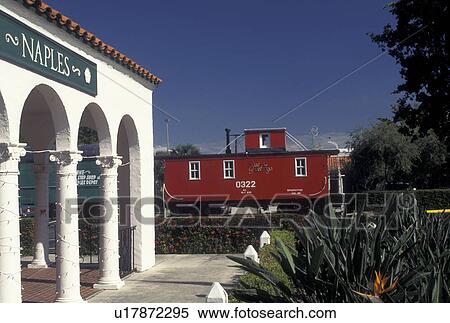 Naples, FL, Gulf of Mexico, Florida, A red caboose parked outside the Naples Depot Civic & Cultural Center is housed in a renovated 1927 train station in Naples. View Large Photo Image Stock Photography - Naples, FL, Gulf of Mexico, Florida, A red caboose parked outside the Naples Depot Civic & Cultural Center is housed in a renovated 1927 train station in Naples.. Fotosearch