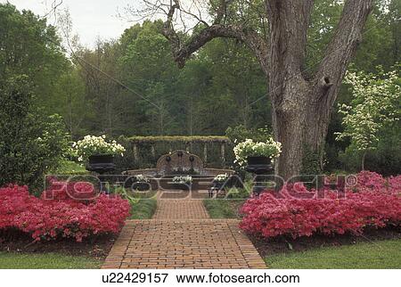 Stock Photo -  Natchez, MS, Mississippi, Spring Pilgrimage at the Monmouth House Gardens at The Natchez Pilgrimage. . Fotosearch
