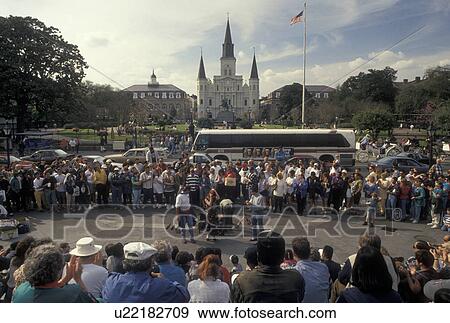 New Orleans, French Quarter, Louisiana, LA, Street artists entertaining a crowd of people in Washington Artillery Park in the French Quarter of New Orleans. View Large Photo Image Stock Photo - New Orleans, French Quarter, Louisiana, LA, Street artists entertaining a crowd of people in Washington Artillery Park in the French Quarter of New Orleans. . Fotosearch