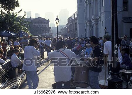 New Orleans, LA, French Quarter, St. Louis Cathedral, Louisiana, Street musicians entertain a crowd of people outside the Saint Louis Cathedral in Jackson Square in the French Quarter in New Orleans. View Large Photo Image Stock Photograph - New Orleans, LA, French Quarter, St. Louis Cathedral, Louisiana, Street musicians entertain a crowd of people outside the Saint Louis Cathedral in Jackson Square in the French Quarter in New Orleans. . Fotosearch