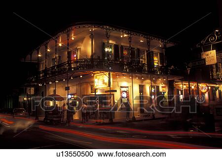 New Orleans, LA, French Quarter, Louisiana, A two story building with cast iron balconies in the French Quarter in New Orleans in the evening. View Large Photo Image Stock Image - New Orleans, LA, French Quarter, Louisiana, A two story building with cast iron balconies in the French Quarter in New Orleans in the evening. . Fotosearch