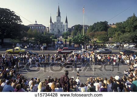 New Orleans, LA, street artist, French Quarter, Louisiana, Crowd gathers to watch a street artist at Washington Artillery Park in New Orleans. View Large Photo Image Stock Photo - New Orleans, LA, street artist, French Quarter, Louisiana, Crowd gathers to watch a street artist at Washington Artillery Park in New Orleans. . Fotosearch