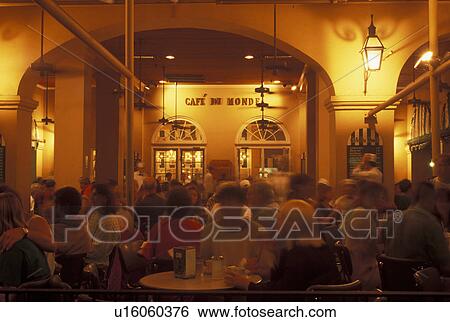 New Orleans, Louisiana, LA, People dining outside CafT du Monde inside the French Market in downtown New Orleans. View Large Photo Image Stock Photograph - New Orleans, Louisiana, LA, People dining outside CafT du Monde inside the French Market in downtown New Orleans.. Fotosearch