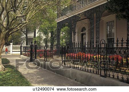 New Orleans, mansion, Garden District, Louisiana, LA, Ornate mansion with cast-iron railings in the Garden District in New Orleans. View Large Photo Image Picture - New Orleans, mansion, Garden District, Louisiana, LA, Ornate mansion with cast-iron railings in the Garden District in New Orleans. . Fotosearch
