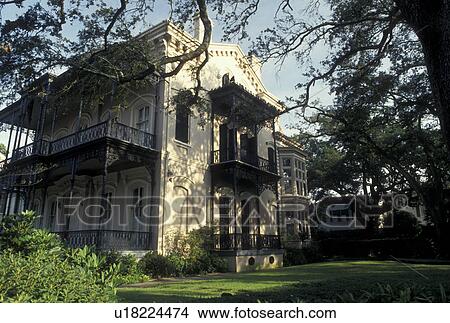 Picture -  New Orleans, mansion, Garden District, LA, Louisiana, Ornate mansion with cast-iron balconies on First Street in the Garden District in New Orleans. . Fotosearch
