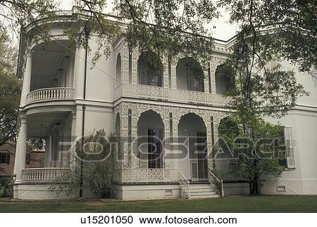 Stock Image -  New Orleans, mansion, Garden District, Louisiana, LA, Ornate mansion in the Garden District in New Orleans. . Fotosearch