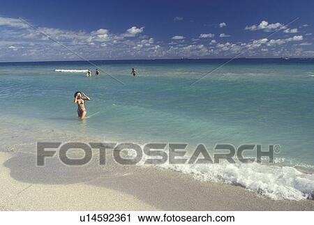 ocean, beach, Miami Beach, FL, Florida, Miami, Atlantic Ocean, People swimming in Atlantic Ocean in Miami Beach. View Large Photo Image Stock Image - ocean, beach, Miami Beach, FL, Florida, Miami, Atlantic Ocean, People swimming in Atlantic Ocean in Miami Beach.. Fotosearch