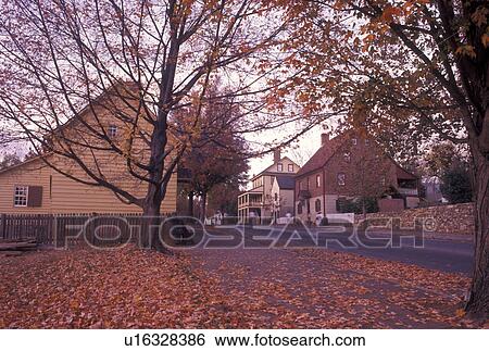 Stock Photograph -  Old Salem, Winston-Salem, NC, North Carolina, Historical buildings in Old Salem, a living history restoration of the Moravian Church town of Salem founded in 1766, in the fall in Winston-Salem.. Fotosearch
