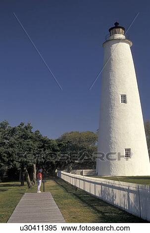 Outer Banks, lighthouse, Cape Hatteras National Seashore, North Carolina, Ocracoke, NC, Ocracoke Island Lighthouse in Ocracoke on Cape Hatteras National Seashore on the Outer Banks. View Large Photo Image Stock Photography - Outer Banks, lighthouse, Cape Hatteras National Seashore, North Carolina, Ocracoke, NC, Ocracoke Island Lighthouse in Ocracoke on Cape Hatteras National Seashore on the Outer Banks.. Fotosearch