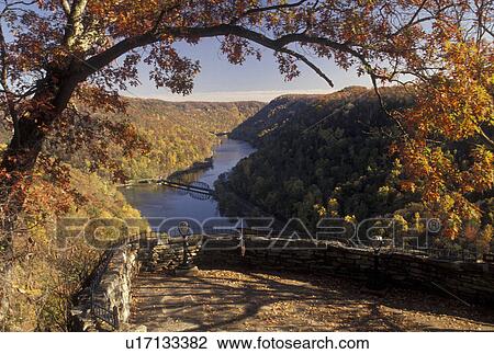 Stock Image -  overlook, New River Gorge, WV, fall foliage, river, Ansted, West Virginia, Scenic overlook at Hawk's Nest State Park of New River in autumn in Ansted.. Fotosearch