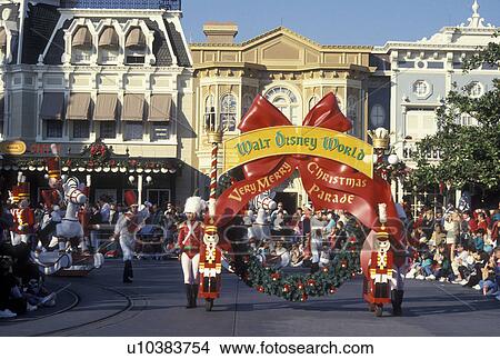 parade, Disney World, Orlando, Magic Kingdom, FL, Lake Buena Vista, Florida, Crowds line Main Street U. S. A. for A Very Merry Christmas Parade during the Christmas holiday in the Magic Kingdom at Walt Disney World in Lake Buena Vista. View Large Photo Image Picture - parade, Disney World, Orlando, Magic Kingdom, FL, Lake Buena Vista, Florida, Crowds line Main Street U. S. A. for A Very Merry Christmas Parade during the Christmas holiday in the Magic Kingdom at Walt Disney World in Lake Buena Vista.. Fotosearch