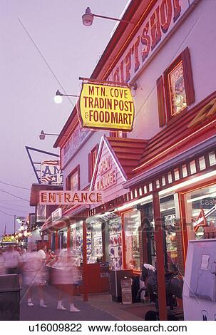 Pigeon Forge, TN, Tennessee, Gift shop illuminated with neon lights in Pigeon Forge at night. View Large Photo Image Stock Image - Pigeon Forge, TN, Tennessee, Gift shop illuminated with neon lights in Pigeon Forge at night.. Fotosearch
