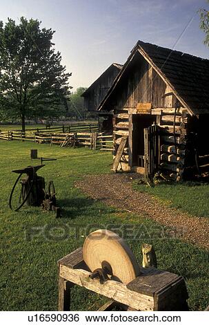 Stock Photograph -  pioneer farm, Norris, TN, Tennessee, Buildings on the farm at the Museum of Appalachia a pioneer mountain village in Norris.. Fotosearch