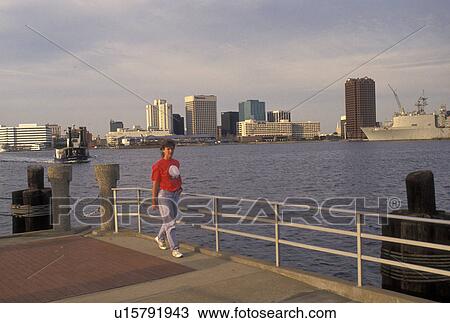 Portsmouth, Virginia, Hampton Roads, VA, Portsmouth Waterfront with a view of the downtown skyline of Norfolk along the Elizabeth River. View Large Photo Image Stock Image - Portsmouth, Virginia, Hampton Roads, VA, Portsmouth Waterfront with a view of the downtown skyline of Norfolk along the Elizabeth River.. Fotosearch