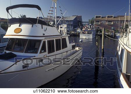 Stock Image -  Punta Gorda, FL, fishing boats, Gulf of Mexico, Florida, City Dock and Fisherman's Village Marina along the banks of Peace River in Punta Gorda.. Fotosearch