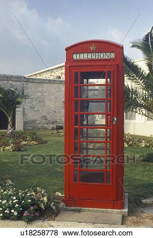 red telephone booth, Bermuda, The West End, Sandy's Parish, Red telephone booth outside The Cooperage at the Royal Naval Dockyard at the end of Ireland Island in Sandy's Parish in Bermuda. View Large Photo Image Stock Photo - red telephone booth, Bermuda, The West End, Sandy's Parish, Red telephone booth outside The Cooperage at the Royal Naval Dockyard at the end of Ireland Island in Sandy's Parish in Bermuda. . Fotosearch