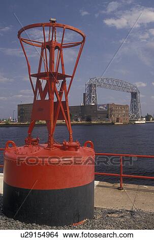 red warning buoy, Duluth, MN, Minnesota, Lake Superior, View of Duluth Harbor and Aerial Lift Bridge on Lake Superior in Duluth. View Large Photo Image Picture - red warning buoy, Duluth, MN, Minnesota, Lake Superior, View of Duluth Harbor and Aerial Lift Bridge on Lake Superior in Duluth.. Fotosearch