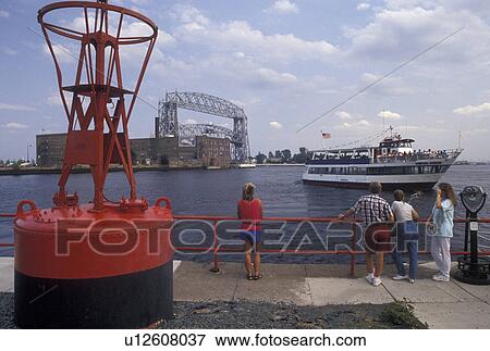red warning buoy, Duluth, MN, Minnesota, Lake Superior, View of Vista Fleet Harbor Cruise on Duluth Harbor and Aerial Lift Bridge on Lake Superior in Duluth. View Large Photo Image Stock Photo - red warning buoy, Duluth, MN, Minnesota, Lake Superior, View of Vista Fleet Harbor Cruise on Duluth Harbor and Aerial Lift Bridge on Lake Superior in Duluth.. Fotosearch