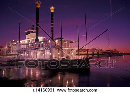 Stock Image -  riverboat, casino, sunset, Natchez, Mississippi River, MS, Mississippi, Lady Luck Natchez Riverboat Casino on the Mississippi River at sunset in Natchez. . Fotosearch