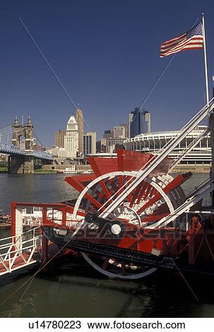 riverboat, Cincinnati, OH, Ohio, Mike Fink's Riverboat Restaurant along the Ohio River with a view of the downtown skyline of Cincinnati and Cinergy Field, home of the Cincinnati Reds. View Large Photo Image Stock Image - riverboat, Cincinnati, OH, Ohio, Mike Fink's Riverboat Restaurant along the Ohio River with a view of the downtown skyline of Cincinnati and Cinergy Field, home of the Cincinnati Reds.. Fotosearch