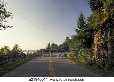 Stock Image -  road, NC, Blue Ridge Parkway, North Carolina, Blue Ridge, The Blue Ridge Parkway is a scenic drive winding through the mountains of North Carolina.. Fotosearch