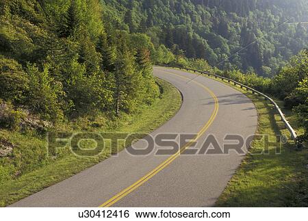 Stock Photograph -  road, NC, Blue Ridge Parkway, North Carolina, The Blue Ridge Parkway is a scenic drive through the mountains in North Carolina.. Fotosearch