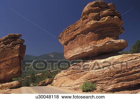 Stock Photo -  rock formations, Garden of the Gods, Colorado Springs, CO, Colorado, Towering red sandstone formations at the Garden of the Gods in Colorado Springs.. Fotosearch